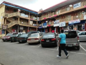 Inside a tech shop at Banex Plaza Abuja showing a variety of computer peripherals.